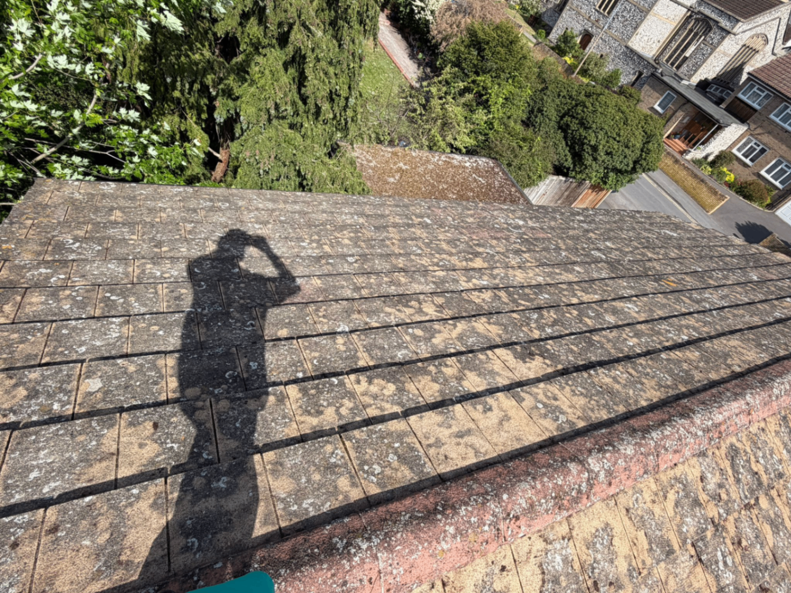 Same roof ridge and slope after cleaning